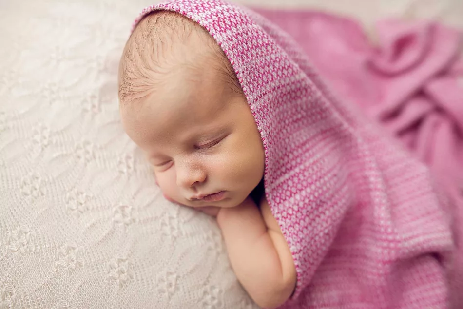 newborn photo with woven textile